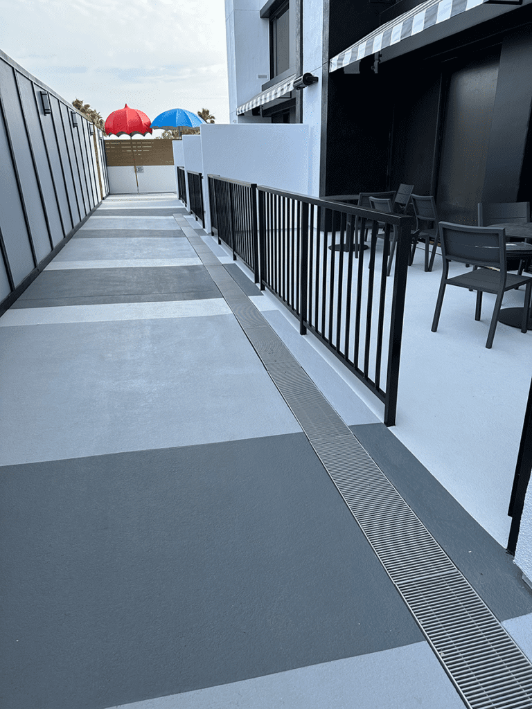 Pool Deck Entryway MACoat Path next to building leading to pool deck